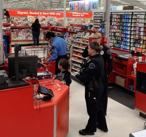 Shop with a Cop Attracts Dozens of Kids, Santa