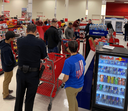 Shop with a Cop Attracts Dozens of Kids, Santa