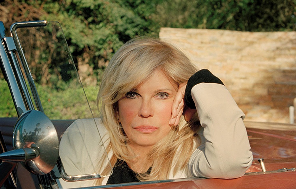 Nancy Sinatra Trades Boots for Car to Lead Parade